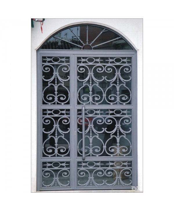 1009 Puerta elegante con rizos de hierro fundido