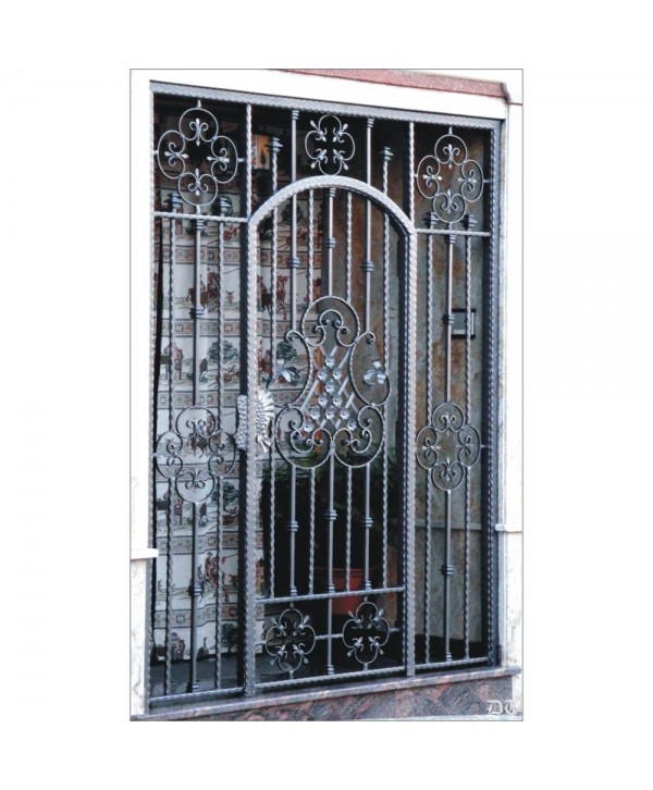 1582 Cancela con rizos de forja y hojas especiales