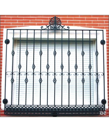 3044 Reja con solera tradicional de fundido y barrotes de piña
