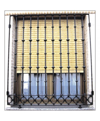 3109 Reja con remates de fundición y macollas